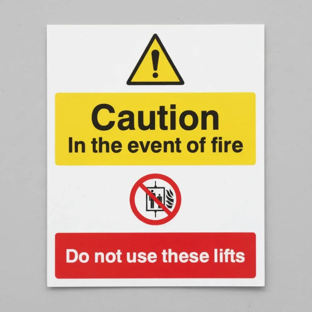 11220Y Caution in the event of fire do not use these lifts Rigid Plastic (200x300mm) Safety Sign