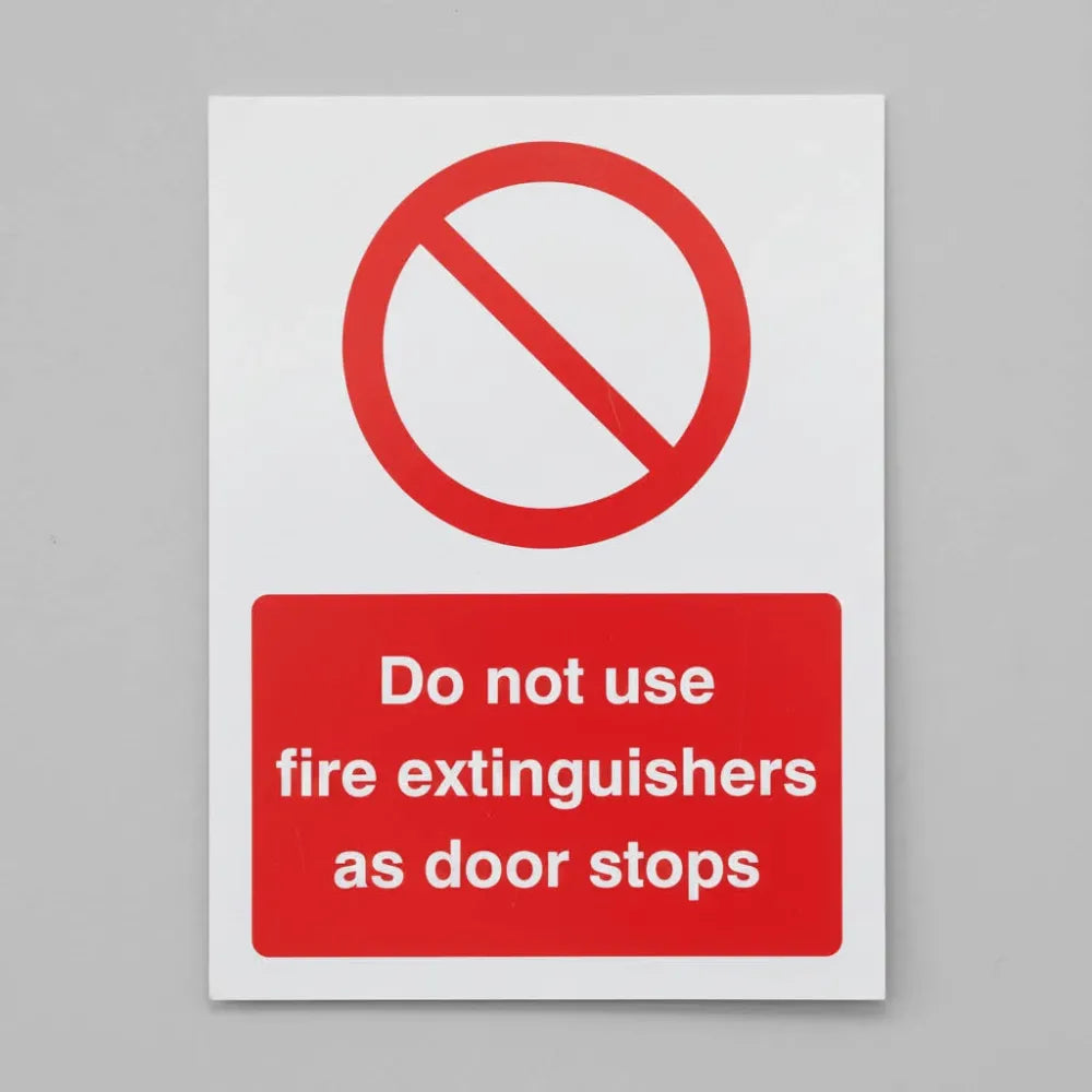 Do not use fire extinguishers as door stops