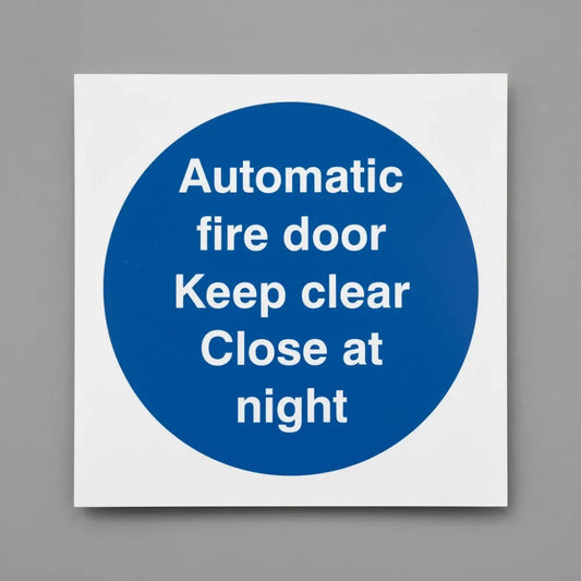 Automatic fire door keep clear close at night