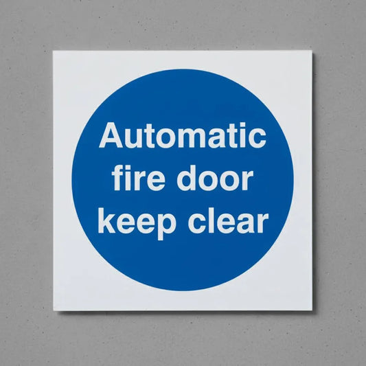 Automatic fire door keep clear