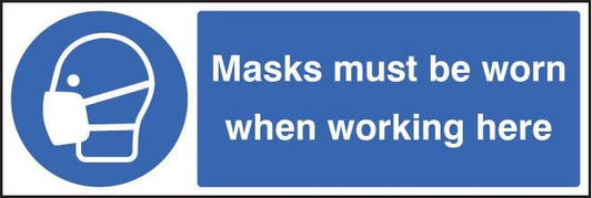 25207G Masks must be worn when working here Self Adhesive Vinyl (300x100mm) Safety Sign