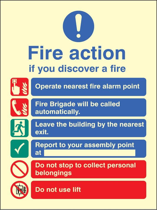 31428H Fire action auto dial with lift Photoluminescent Rigid (300x250mm) Safety Sign