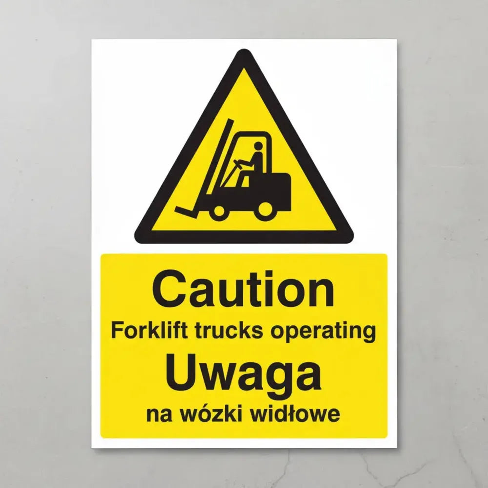 Caution forklift trucks operating (english/polish)