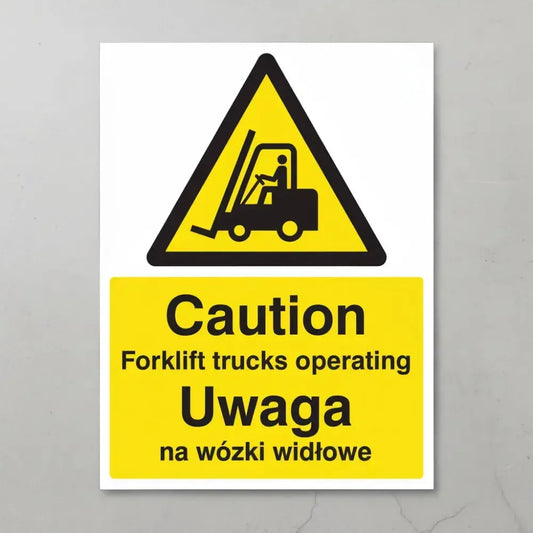 Caution forklift trucks operating (english/polish)
