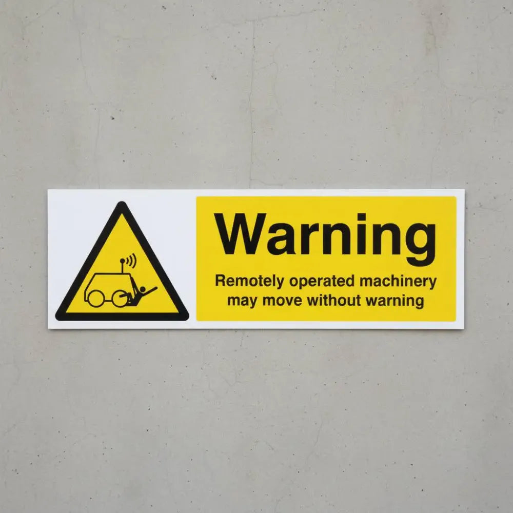 24318M Warning Remotely operated machinery may move without warning Self Adhesive Vinyl (600x200mm) Safety Sign