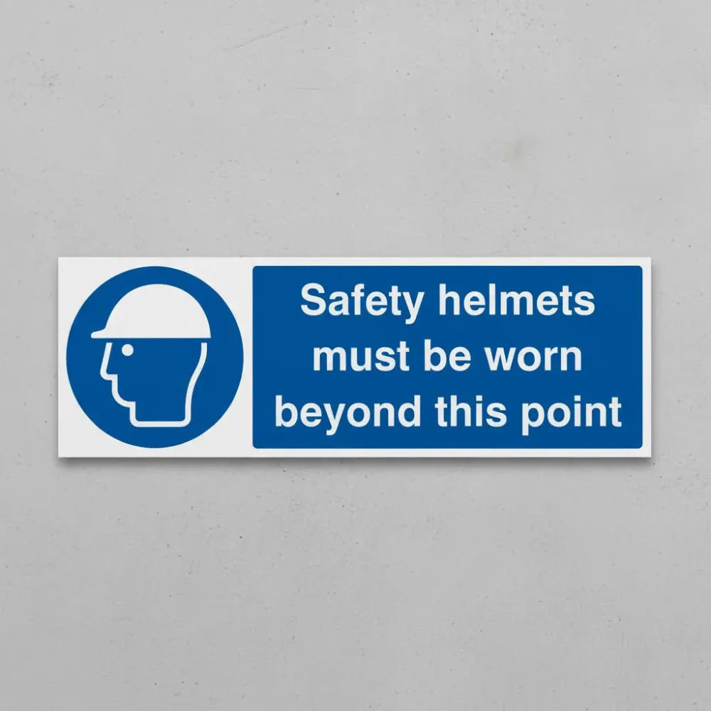 Safety helmets must be worn beyond this point