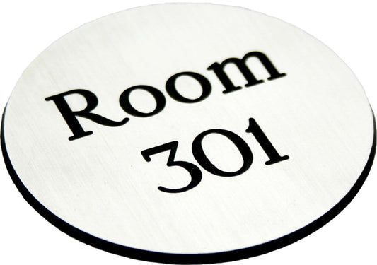 51549 Engraved Sign with adhesive backing - 95mm dia White text on black  (95mm dia) Safety Sign