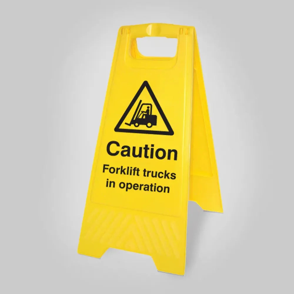 Caution forklift trucks in operation (free-standing yellow floor sign)