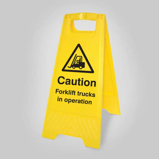 Caution forklift trucks in operation (free-standing yellow floor sign)