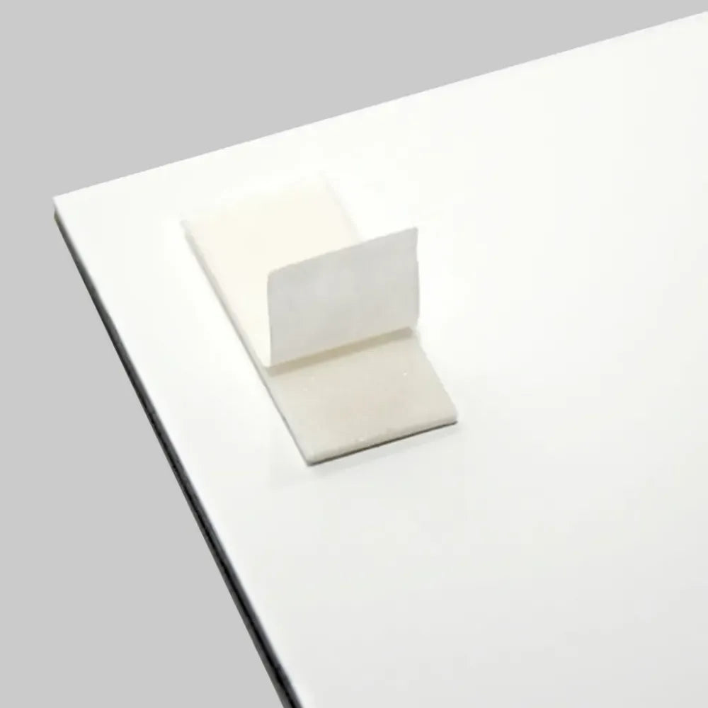 Double sided adhesive pads (pack of 4) 25x10mm