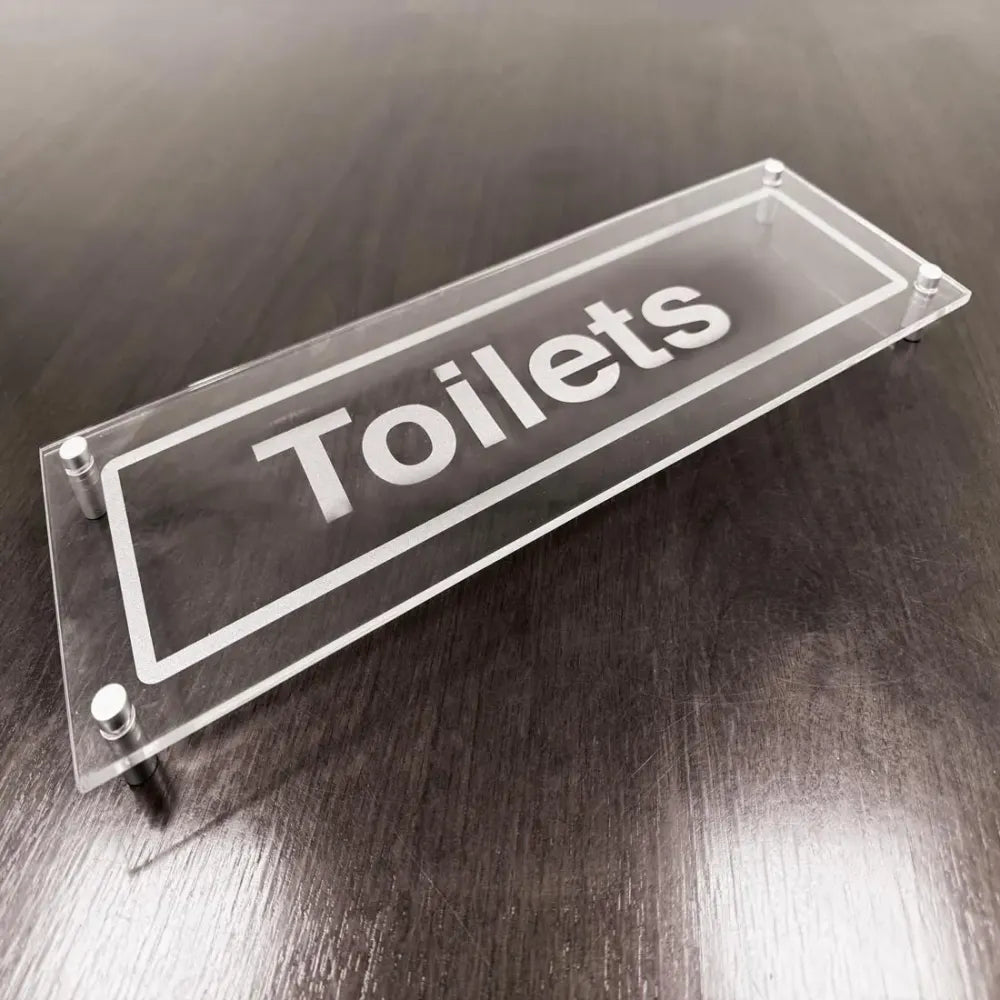 Toilets visual impact 5mm acrylic sign 450x150mm c/w stand off locators