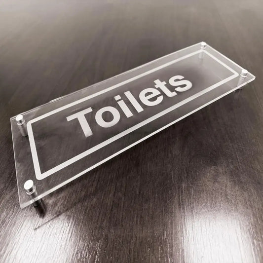 Toilets visual impact 5mm acrylic sign 450x150mm c/w stand off locators