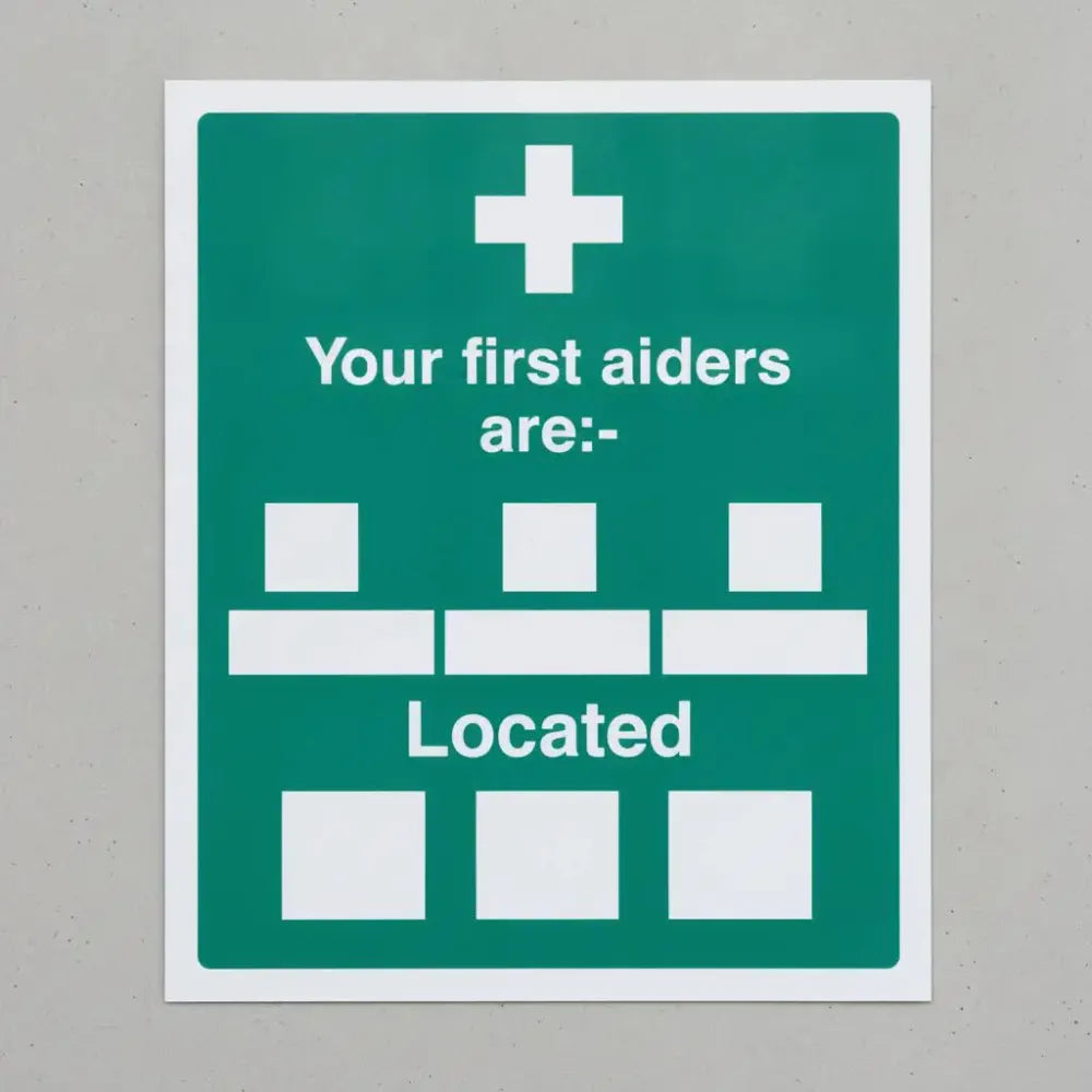 16029Y Your first aiders are Rigid Plastic (200x300mm) Safety Sign