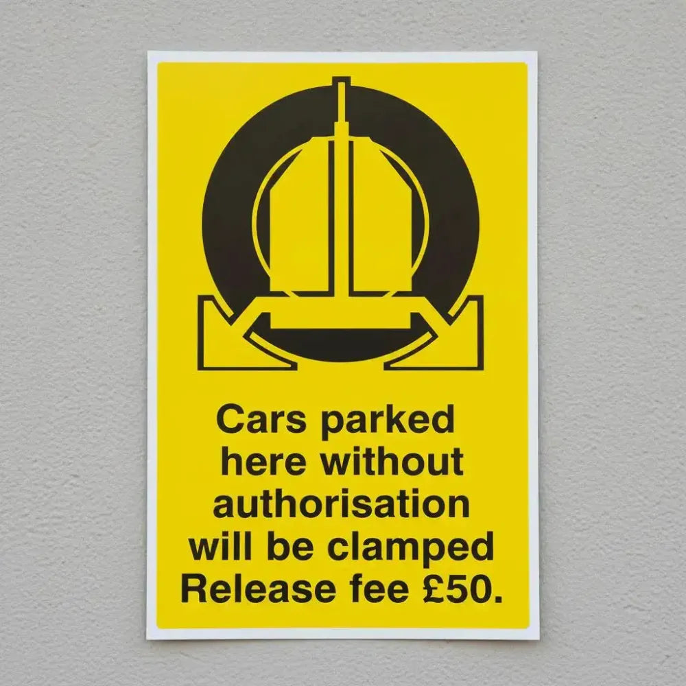 Cars parked here without authorisation will be clamped release fee £50